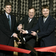 Executives cut the ceremonial red ribbon marking the grand opening of the newest LeMeridien luxury hotel June 6, 2003 in Minneapolis, Minnesota.